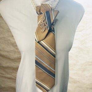 Wembley Tan, Blue, and White Striped Necktie with Music Note Brooch